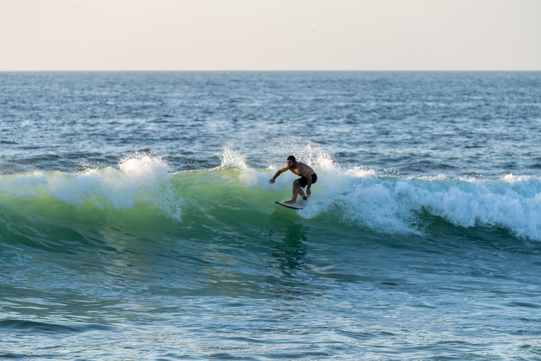Surfer-riding-waves-in-Furadouro-Beach